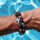 Cross bracelet with onyx and red leopard